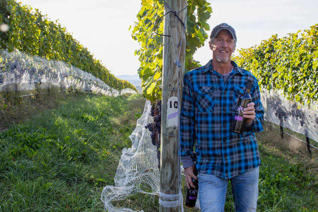 Bob Rupy, owner of October One Vineyard holding bottle of the 2019 Cabernet Sauvignon winner of the Virginia Governor's Cup 2021